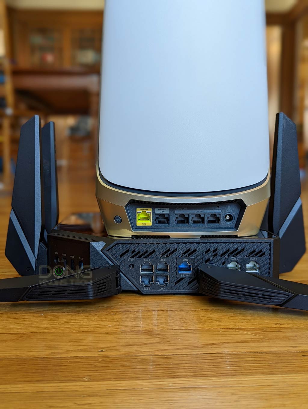 Netgear Orbi RBRE960 Standalone Router Review: Overpriced and Handicapped 5 Asus GT-AXE16000 vs. Netgear Orbi RBRE960 2