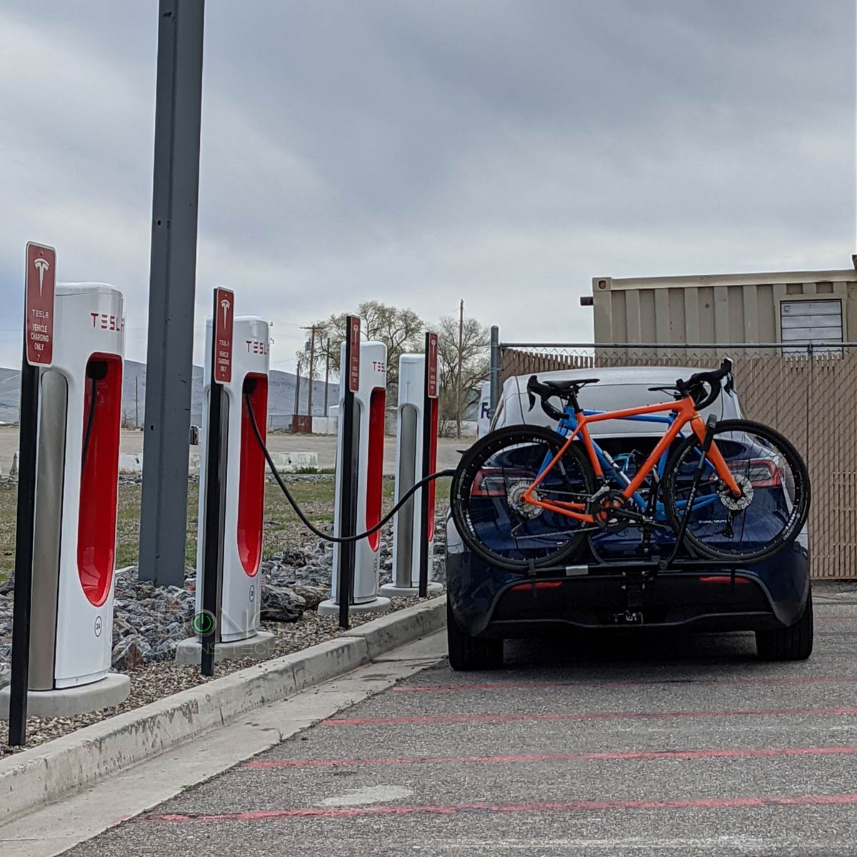 Tesla to Open up Superchargers: US's Winding Road to Universal Public Charging 10 Tesla Supercharger Car with Tow Hitch