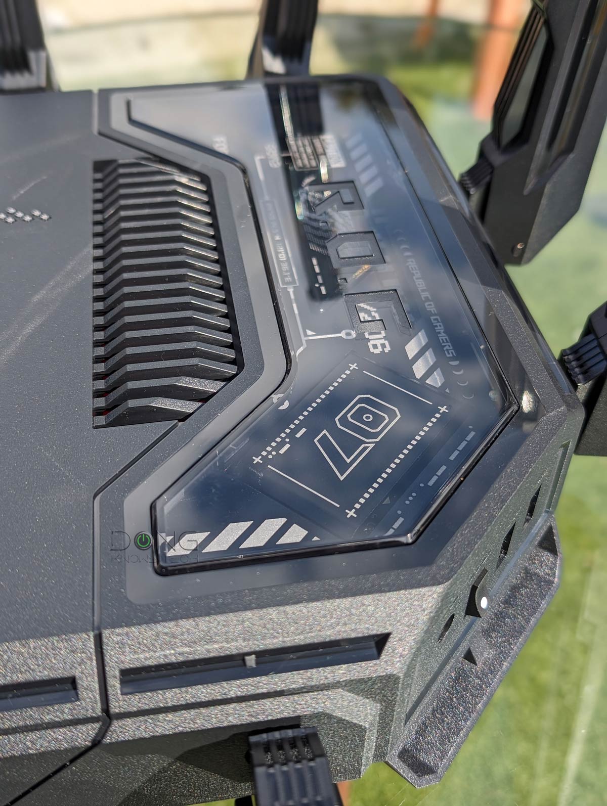 Asus ROG Rapture GT-BE98 Pro Review (vs. Netgear RS700S): An Excellent Next-Gen Top-tier Gaming Router 5 The Asus GT-BE98 Pro has a fancy top with a seenthrough portion