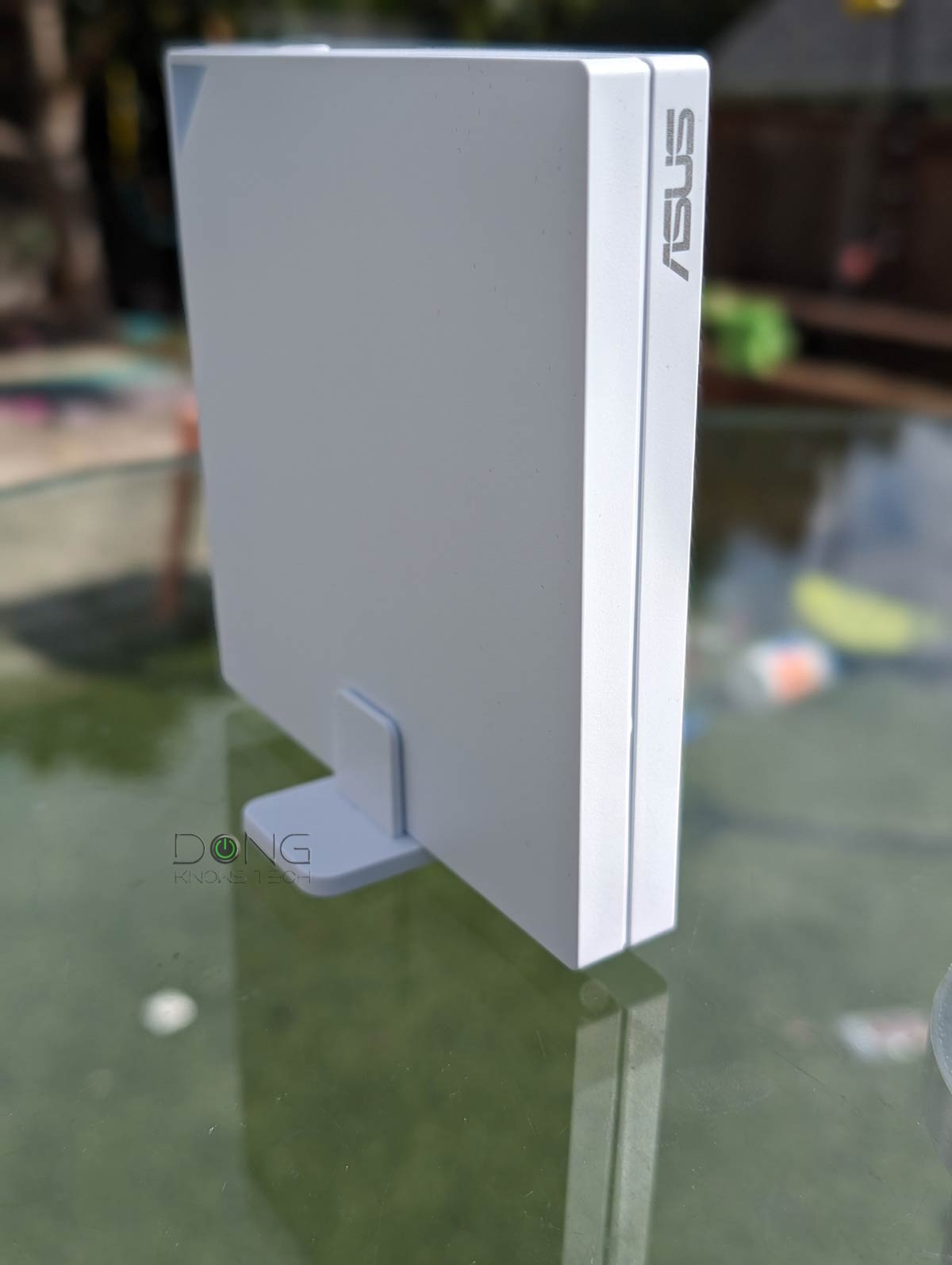 Asus RT-AX57 Go Review (vs. Netgear M6 Pro): An Impressive Little Wi-Fi 6 Travel Router 7 The Asus RT-AX57 Go comes with a base for vertical placement