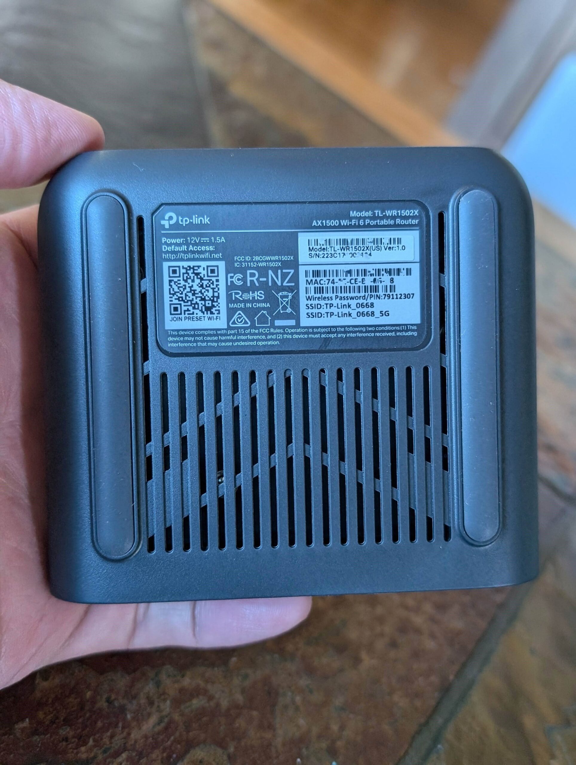 TP-Link TL-WR1502X Review (vs. Asus RT-AX57 Go): A Decent Pocket-Size Wi-Fi 6 Travel Router 9 The underside of the TP-Link TL WR1502X